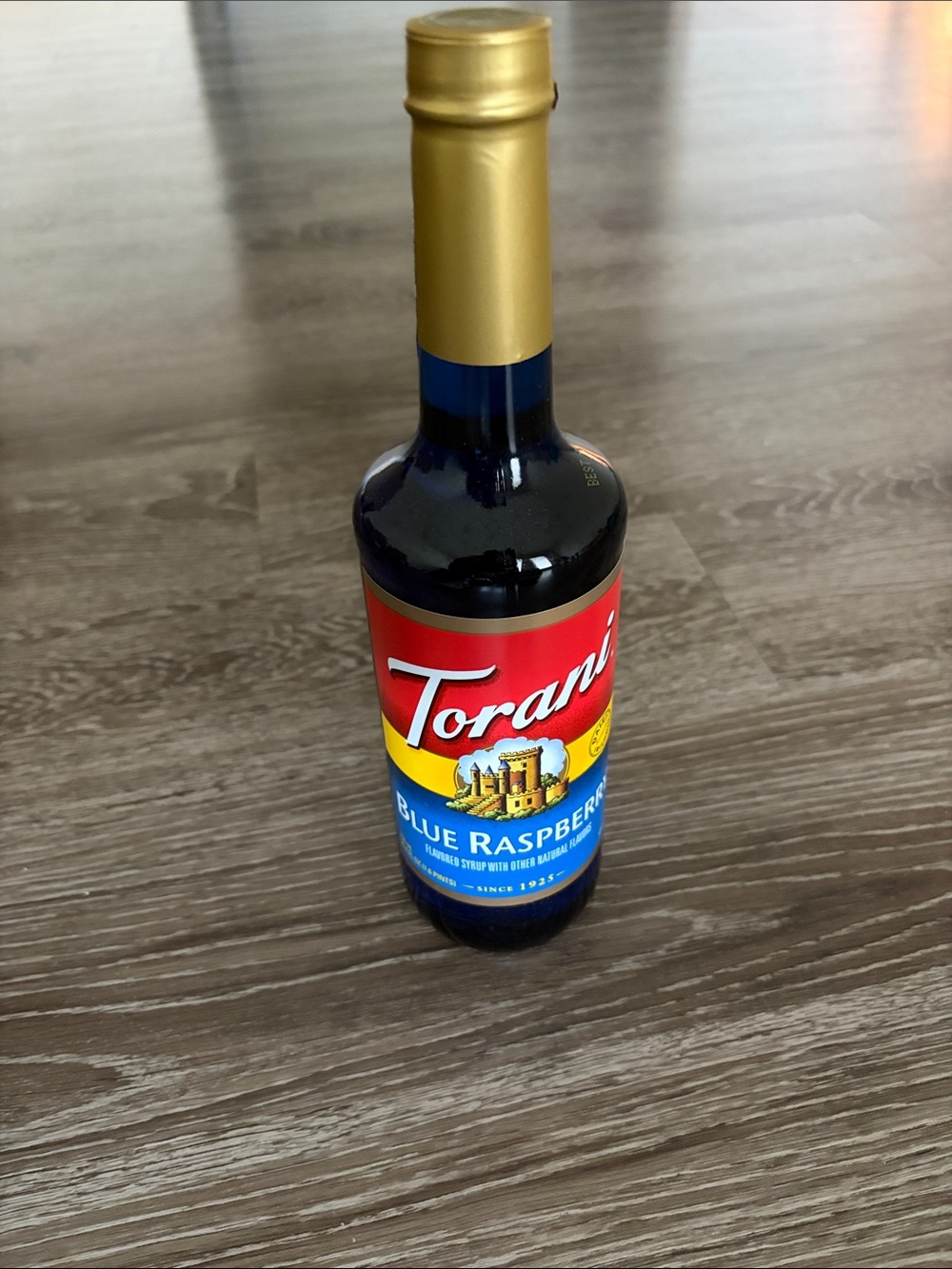 Torani Blue Raspberry Syrup Bottle - Bright Blue